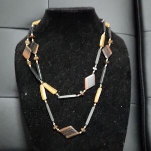 Multi layer geometric wood pattern Earth tones statement necklace